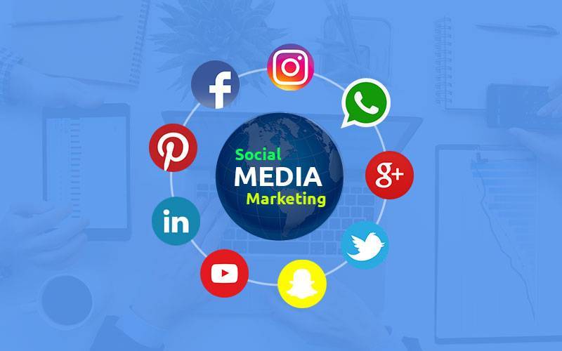 A blue-themed graphic representing social media marketing. In the center is a globe with "Social Media Marketing" written on it. Surrounding it are icons for popular social media platforms, including Facebook, Instagram, WhatsApp, Google+, Twitter, Pinterest, LinkedIn, YouTube, and Snapchat.