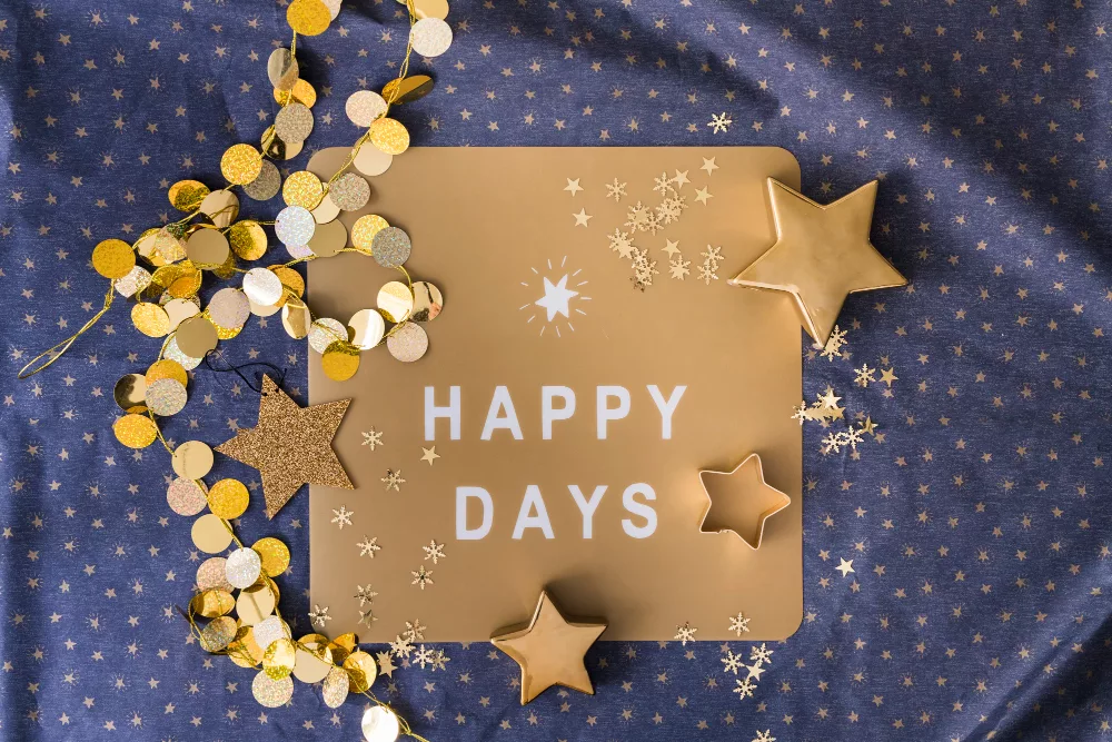 happy days inscription on paper with stars