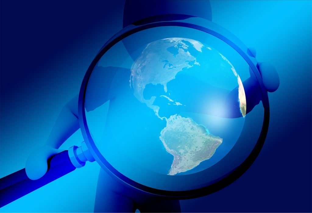 hand, magnifying glass, earth, Detection and Analysis of Security Incidents