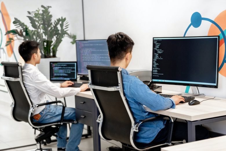 People Using Computers at Work, 5 Benefits of Upskilling and Reskilling Your Employees