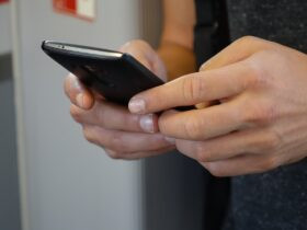 smartphone, hands, tap, How to Receive SMS without a Phone Using Virtual Numbers
