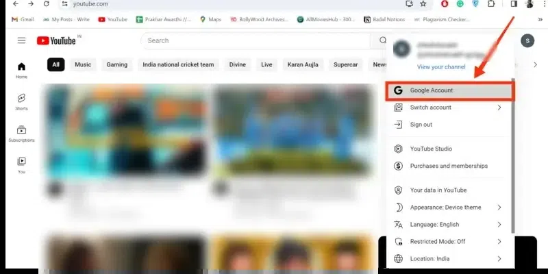 Open Google YouTube and visit your profile by clicking on it and choosing “Google Account” from the menu.