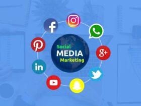 A blue-themed graphic representing social media marketing. In the center is a globe with "Social Media Marketing" written on it. Surrounding it are icons for popular social media platforms, including Facebook, Instagram, WhatsApp, Google+, Twitter, Pinterest, LinkedIn, YouTube, and Snapchat.