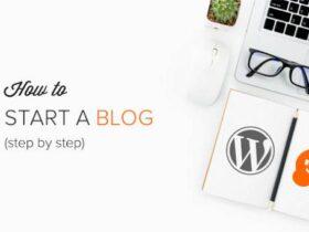 A flat lay image features a notebook with WordPress and Blogger logos, a pen, eyeglasses, a small succulent plant, a wireless mouse, and a laptop. Text on the left reads "How to START A BLOG (step by step).