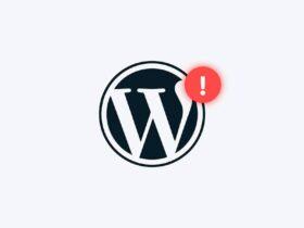 The WordPress logo with a red exclamation mark notification symbol overlaid on the top right corner, indicating an alert or warning. The background is light gray.