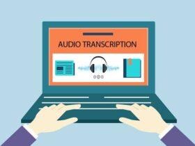 Illustration of hands typing on a laptop. The screen displays a header "AUDIO TRANSCRIPTION" with icons for text, audio waves with headphones, and a document.