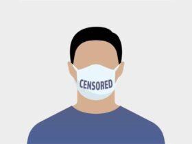 Illustration of a person wearing a face mask labeled "CENSORED" on the front. The figure is depicted from the shoulders up, and the background is light gray. The person has short, dark hair and is wearing a blue shirt.