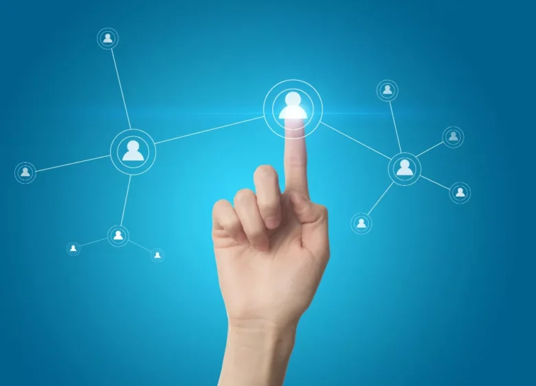 finger pressing a social linkedin network button on a touch screen