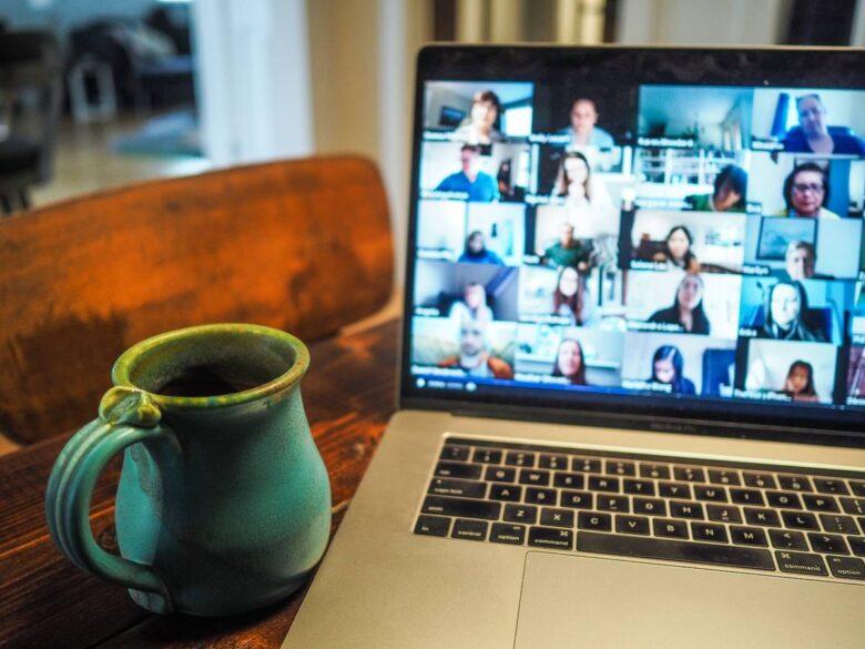 macbook pro displaying group of people, Video Conferencing Tools