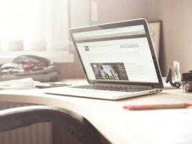 Black and Gray Laptop Computer on Writing Desk, Register to Indian Oil