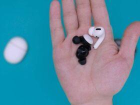 white and black earbuds on persons hand, THESPARKSHOP.IN:PRODUCT/WIRELESS-EARBUDS-BLUETOOTH-5-0-8D-STEREO-SOUND-HI-FI
