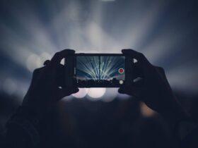 iphone, concert, lights, stage lights, record, video, recording, video recording, capture, apple product, hands, audience, event, live event, live performance, dark, party, smartphone, crowd, video, video, video, video, video