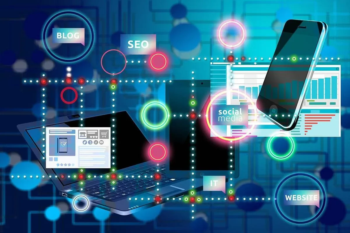Digital illustration showing interconnected elements of online marketing, including a laptop, smartphone, graphs, and icons for "Blog," "SEO," "Social Media," "IT," and "Website." The background features a blue network pattern with vibrant colored lights.