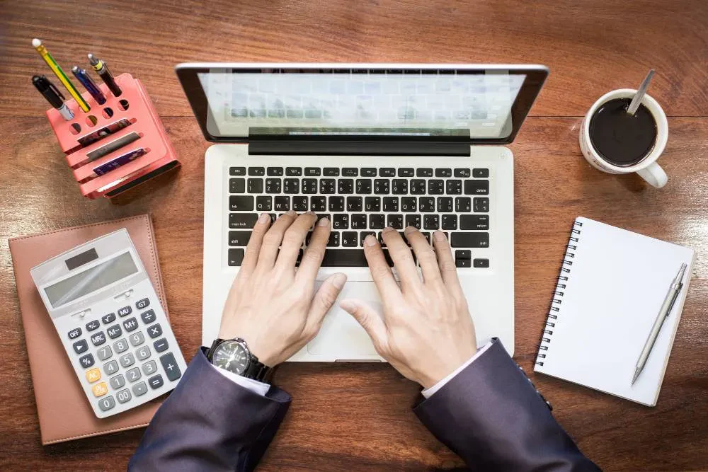 typing on a laptop