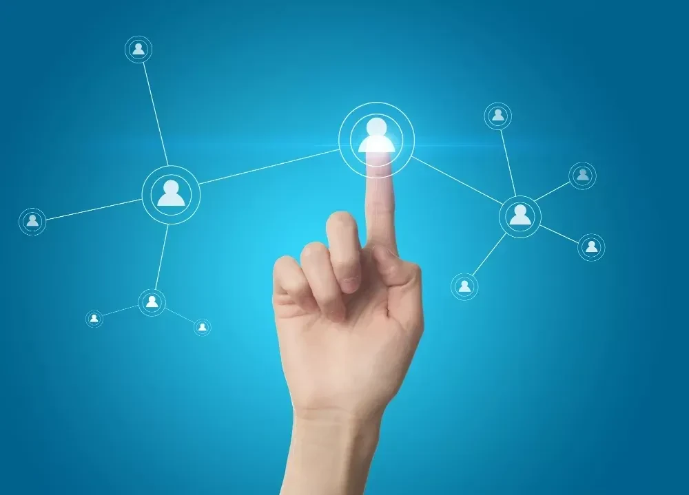 finger pressing a social linkedin network button on a touch screen