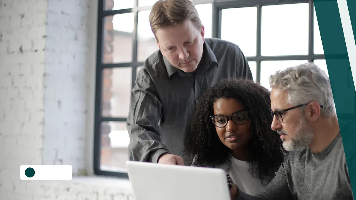 team members discussing in office