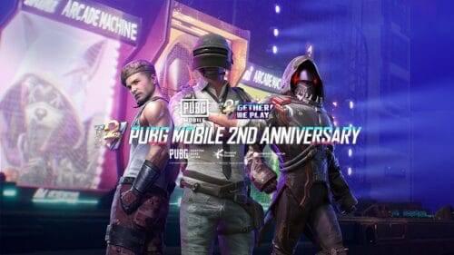 Three characters from PUBG Mobile stand in front of a futuristic backdrop with neon lights. Text reads "PUBG Mobile 2nd Anniversary" at the center.