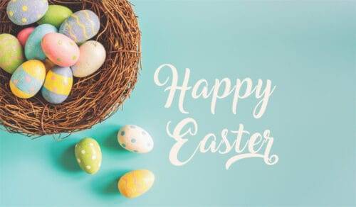 A nest filled with colorful Easter eggs is on the left side of the image, with three more eggs outside the nest. "Happy Easter" is written in white cursive text on the right side against a light blue background.