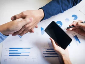 business handshake of two men demonstrating their agreement to sign agreement or contract between their