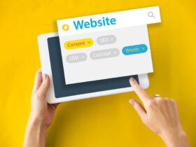 Hands hold a tablet with a floating search box overlay. The search box displays the word "Website" with keywords "Content" in yellow, "SEO" and "SEM" grayed out, "Concept" in gray, and "Words" in blue. The background is solid yellow.