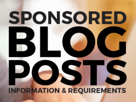 Close-up of a person's hands typing on a laptop keyboard. The words "Sponsored Blog Posts" are in large, bold letters at the top, with "Information & Requirements" in smaller text underneath. The background is blurred, highlighting the focus on the text and hands.