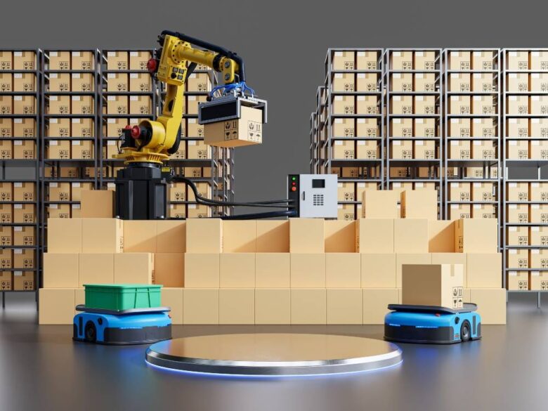 A robotic arm is stacking cardboard boxes on a conveyor in a warehouse, with numerous boxes on shelves in the background. Two blue automated guided vehicles carrying boxes are also visible, highlighting efficient automation in logistics.