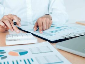 man calculating tax claims for business losses