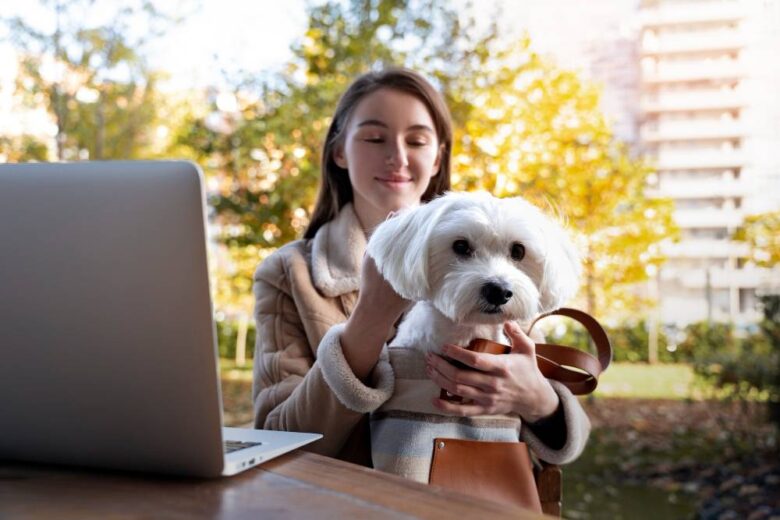 front view woman holding cute dog