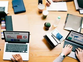 people working on a laptop for Premier Advertising Agency