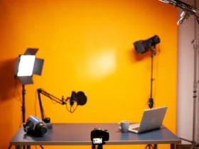 professional podcast and vlogging setup in studio with yellow wall