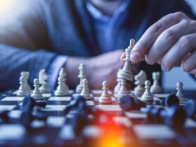 depth of field photography of man playing chess, Effective Business Administration