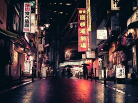 People Walking on Street Near Buildings, Target Salvage liquidation Stores