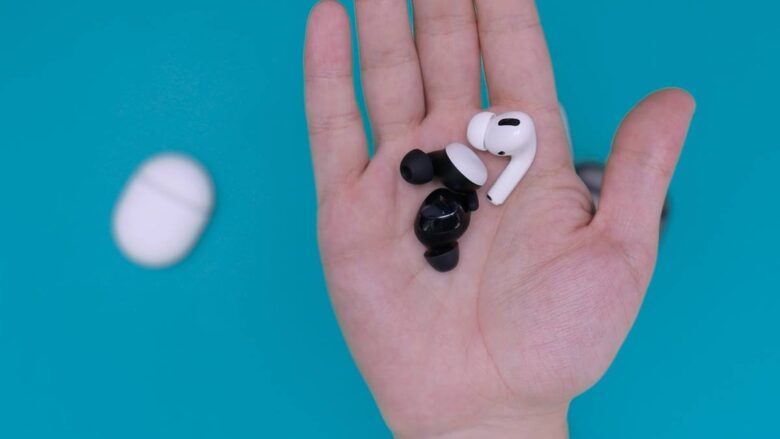 white and black earbuds on persons hand, THESPARKSHOP.IN:PRODUCT/WIRELESS-EARBUDS-BLUETOOTH-5-0-8D-STEREO-SOUND-HI-FI