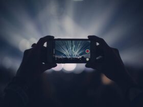 iphone, concert, lights, stage lights, record, video, recording, video recording, capture, apple product, hands, audience, event, live event, live performance, dark, party, smartphone, crowd, video, video, video, video, video