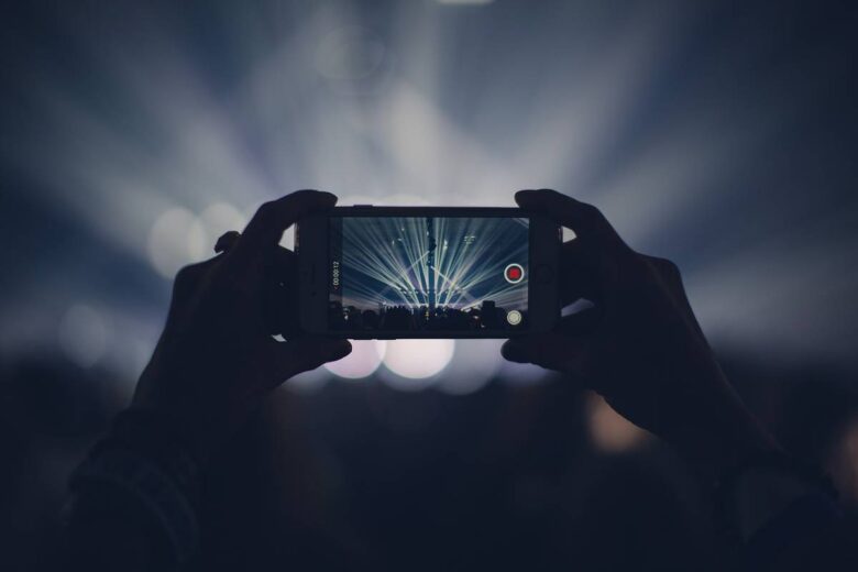 iphone, concert, lights, stage lights, record, video, recording, video recording, capture, apple product, hands, audience, event, live event, live performance, dark, party, smartphone, crowd, video, video, video, video, video